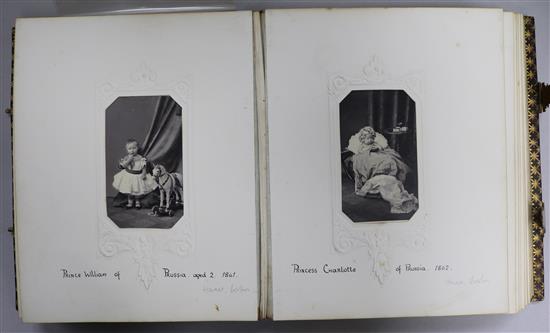 A late Victorian album containing photographs including Queen Victoria and Prince Albert and other members of